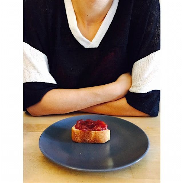 A simple strawberry jam and french baguette on a blue plate #afterbreakfast