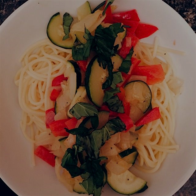 Sautéed veg over gluten-free spaghetti, fresh basil on top 🍝🌿🍝🌿🍝