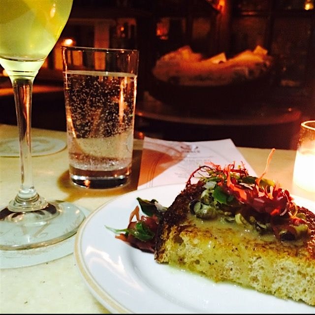 Periwinkle Toast topped with seaweed. Pairs nicely with a French75... As do most things.