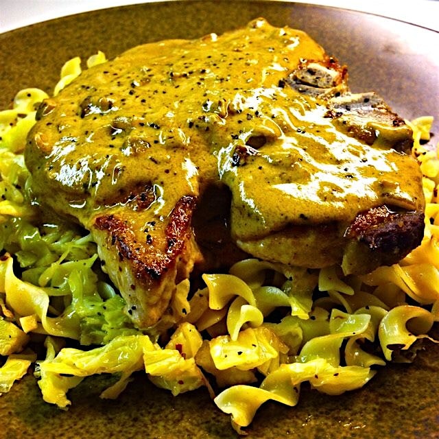 It's snowing outside. But we're toasty warm with our dinner. Grilled, juicy, thick pork chops smo...