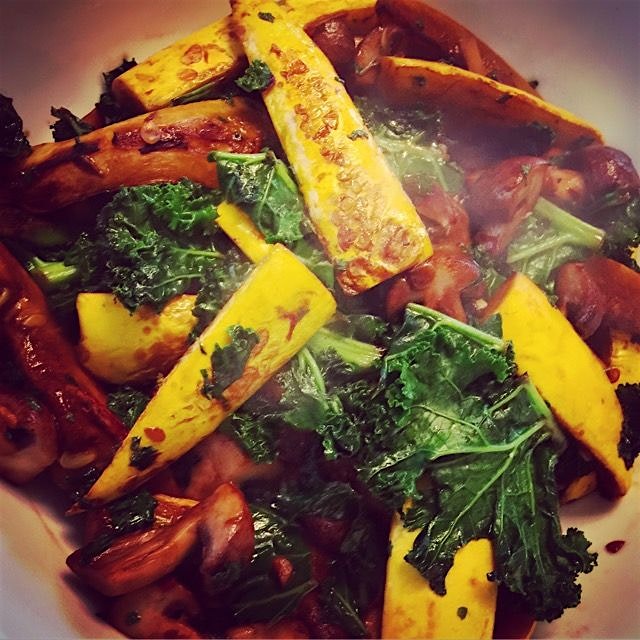 Still steaming, fresh off the pan...Sautéed Kale, Squash, & Shrooms #simplicityiskey 
