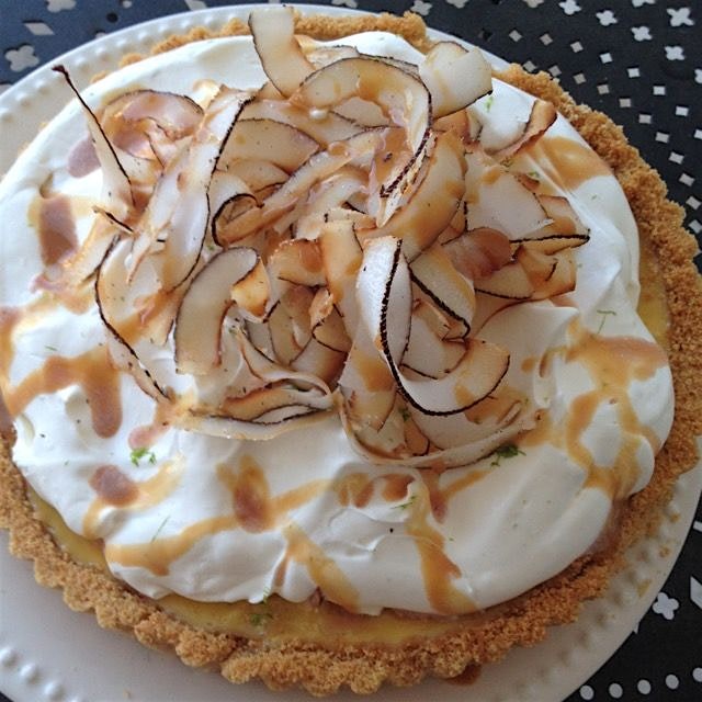 Coconut key lime pie with macadamia nut crust, drizzled with cajeta.  Recipe adapted from Martha ...