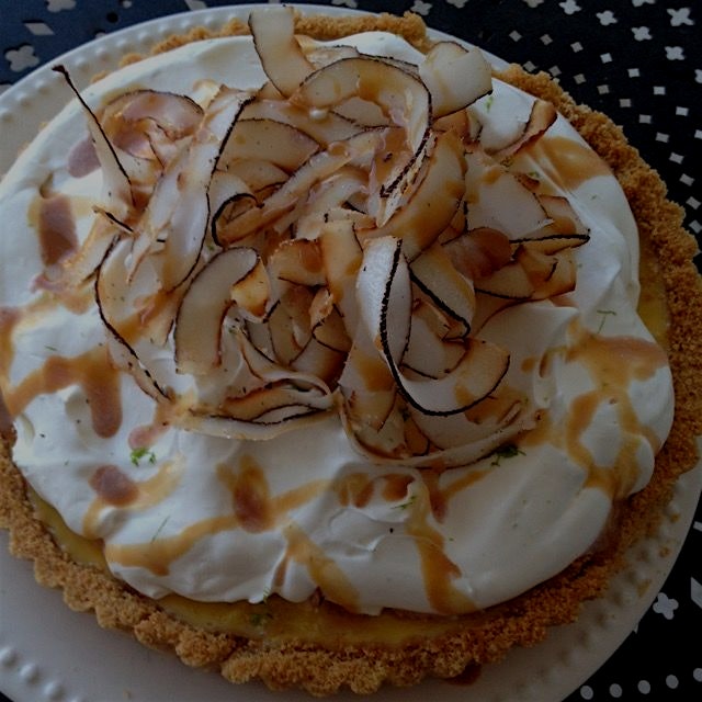 Coconut key lime pie with macadamia nut crust, drizzled with cajeta.  Recipe adapted from Martha ...