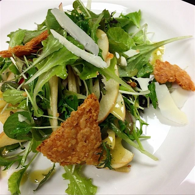 Campus greens, apples, sharp cheddar crisps, pickled shallots, sprouts and kombucha vinagrette 