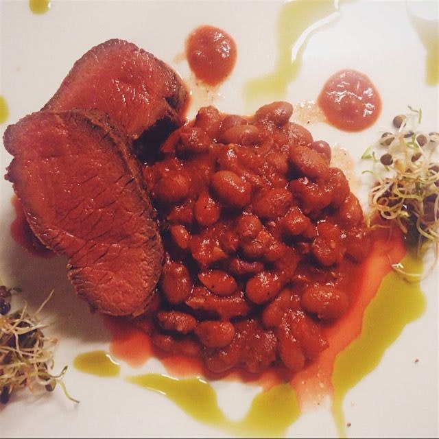 Venison loin, red beans cooked in rabbit stock and pork skin. Rich and delicious. 