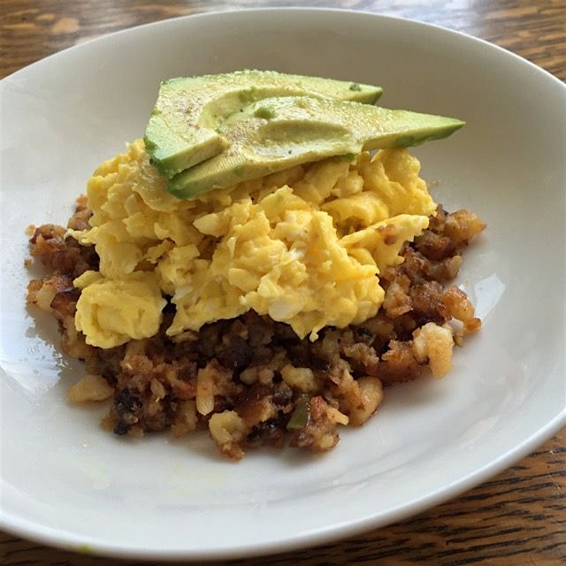 Breakfast from this morning: leftover hash browns with scrambled eggs and avocado 