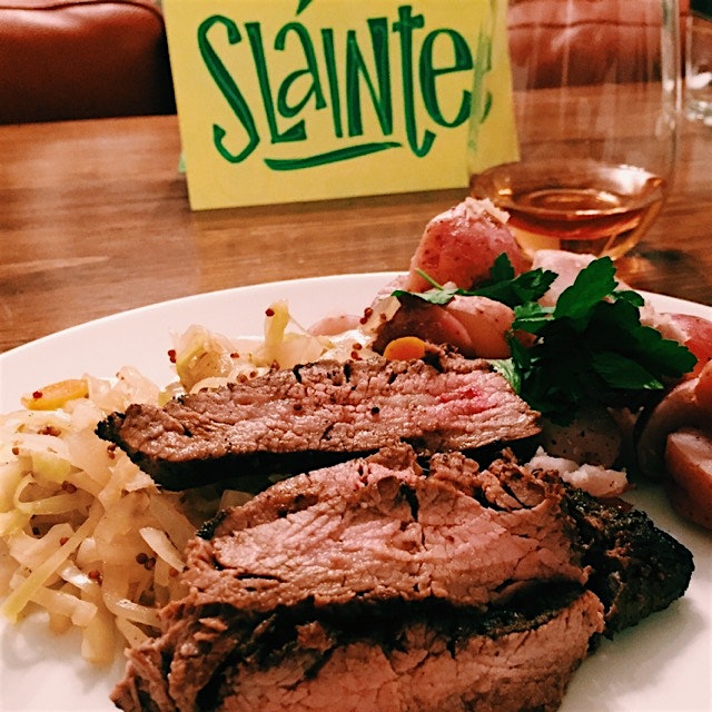 Slainte! Corned beef-spiced flank steak over braised cabbage with boiled red potatoes and a dry r...