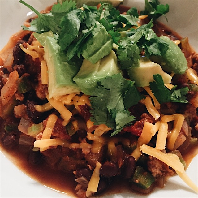 Turkey chili with avocado and cheddar cheese 