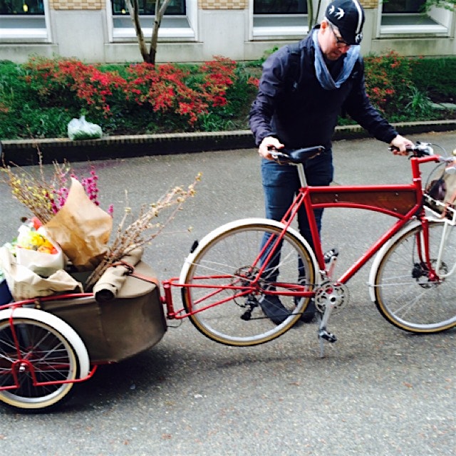 The chef from Ned Ludd with his restaurant bike seen at the farmers market.