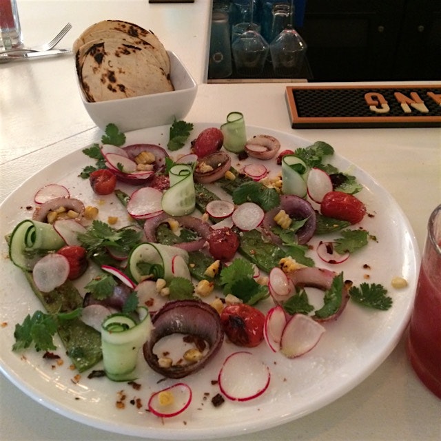 Nopal salad - fresh and spicy medley of roasted and fresh vegetables 