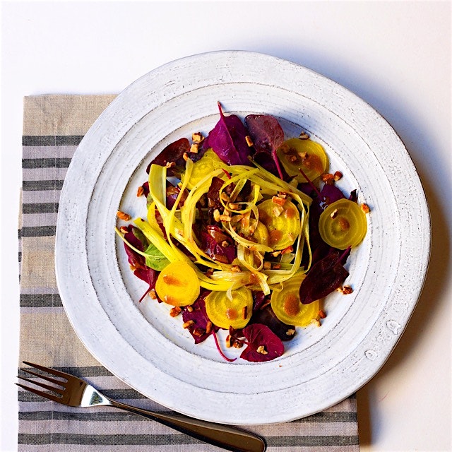 A spring welcoming salad: beets, roasted leeks and heirloom spinach tossed with a balsamic mustar...