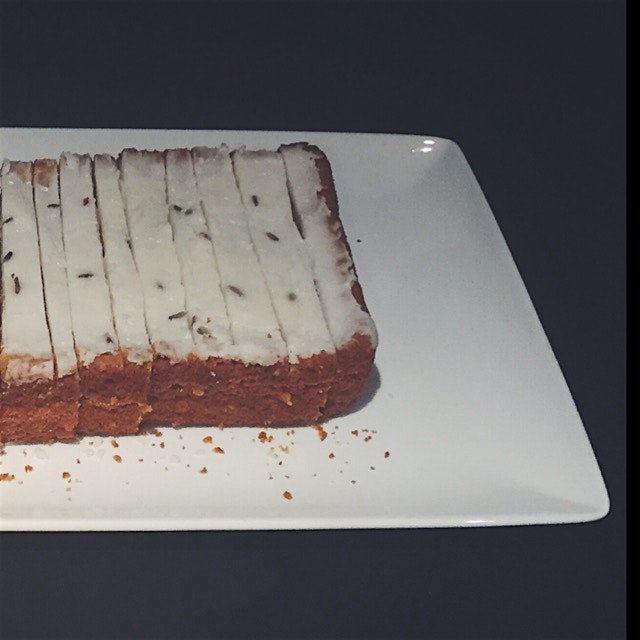 Vegan lemon loaf cake with a lavender icing