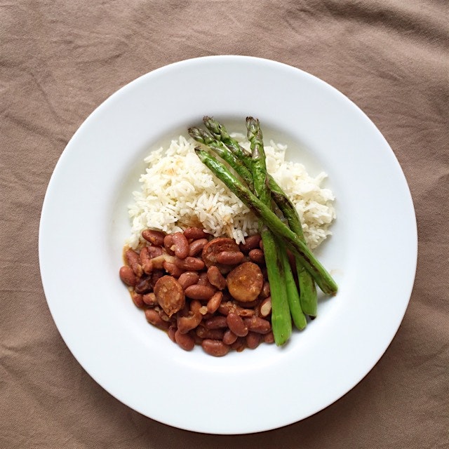 Home cooked beans with chorizo, served with basmati rice and topped with pan fried asparagus 