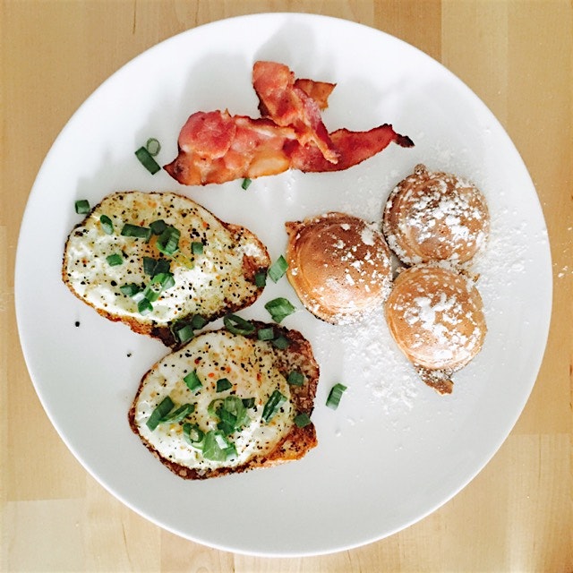 My first homemade Stuffed Danish apple cinnamon Pancakes with crispy egg And a side of bacon