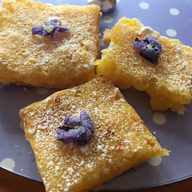 Home made Lemon Squares with sugared organic violets (grown n our garden) Just looks like spring!...