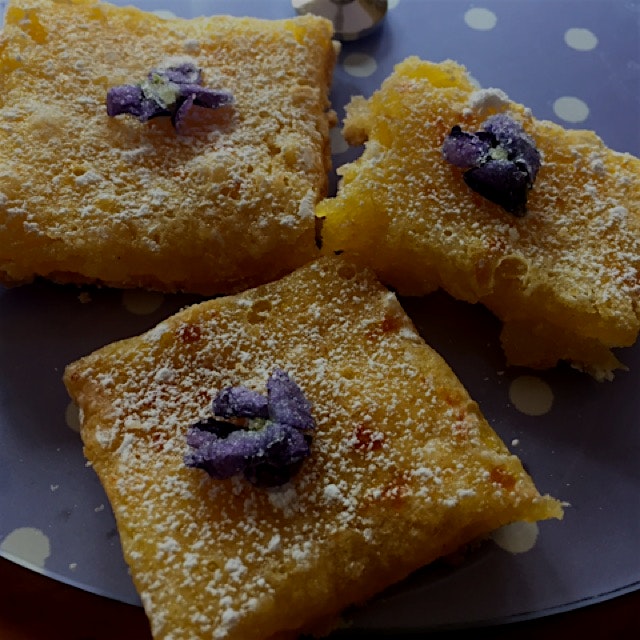 Home made Lemon Squares with sugared organic violets (grown n our garden) Just looks like spring!...