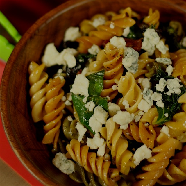 Tri-color rotini pasta with greens