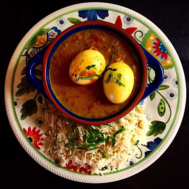 Nadan Mutta Curry. Dinner. Eggs, spicy curry sauce and smoked basmati rice. Oh yes. Just wish we ...