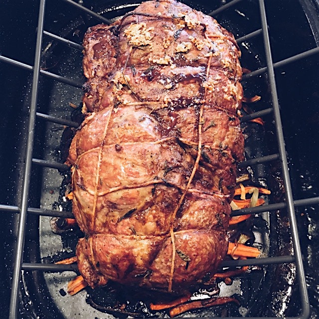 Boneless lamb with rosemary garlic rub. My grandmother's secret: put veggies (carrots, onion, cel...