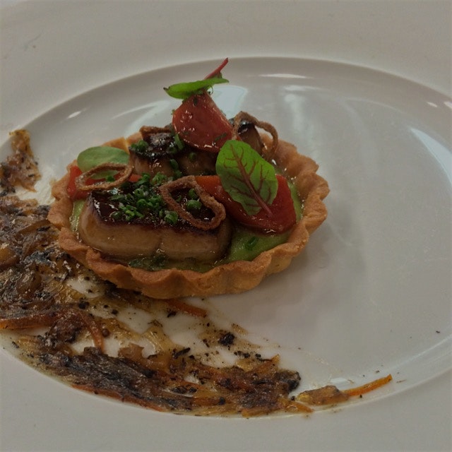 Foie gras tart with ramp and potato purée, pickled beets, and onion marmalade. So good with some ...