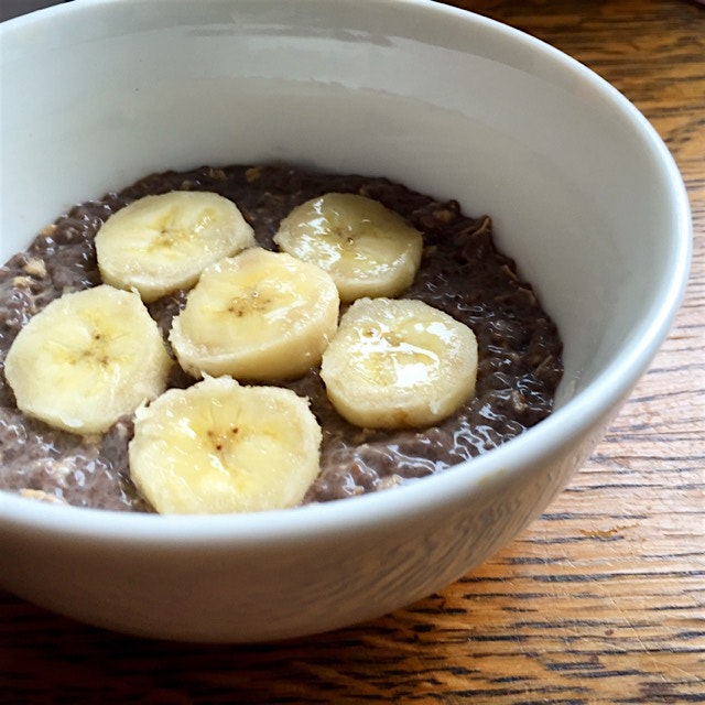 Dark chocolate peanut butter chia (and oatmeal) pudding with sliced banana for breakfast 