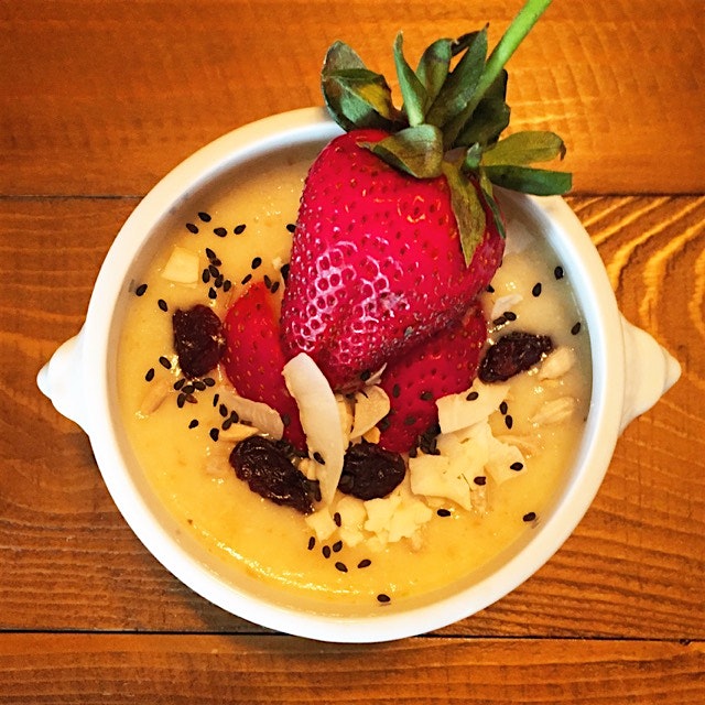 Breakfast smoothie bowl. It's like pineapple sherbet! But with healthy stuff hidden in it 😜 and o...