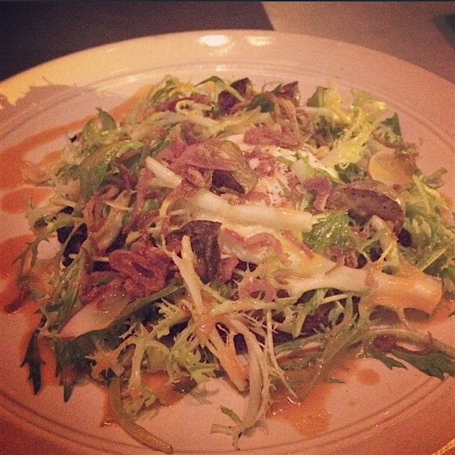 Chef Linton Hopkins' contribution to the menu, Johnny Cake dressed with radish, frisée lettuce, p...
