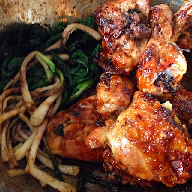 Honey and vinegar grilled chicken with grilled ramps. 