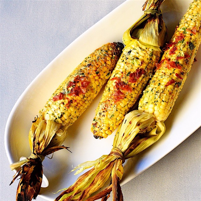 Fired up my grill today: grilled white corns dressed up with a homemade buttery smear of queso fr...