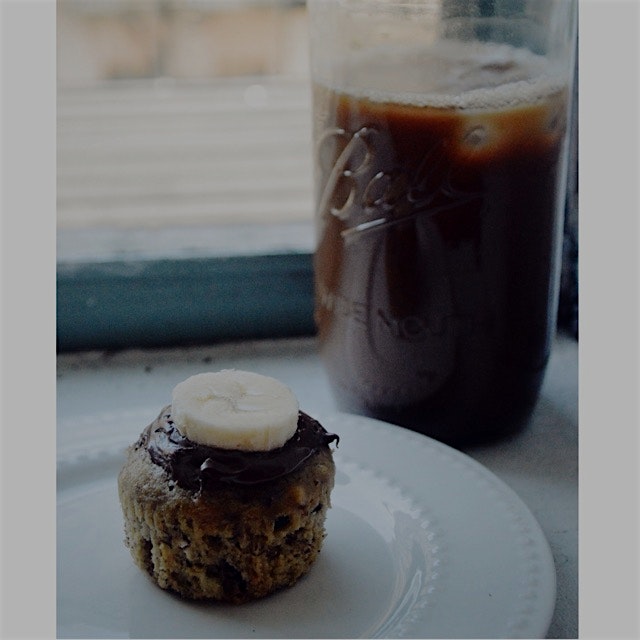 Starting off the day with a warm muffin and cold coffee. Banana bread muffin topped with a little...
