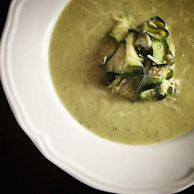 Two brilliant dishes collided in one bowl. Zucchini ribbons in almond pesto surrounded by fresh c...