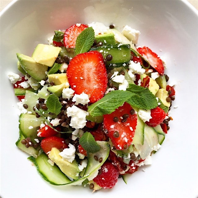 Strawberries lentil salad with cucumber ribbons, avocado, sun-dried tomato, feta cheese and mint....