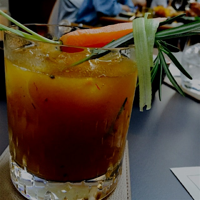 Bloody Mary with fresh yellow tomato juice, saffron, rosemary and a carrot. All in season now in ...