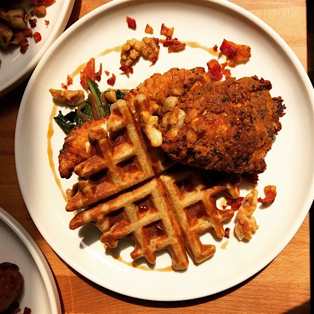 Pepper Buttermilk Fried Chicken & Buckwheat Bacon Waffles w/ Sautéed Mustard & Dandelion Greens a...