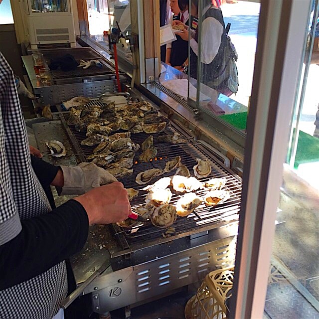 Great grilled Oysters after a long hike in Miyajima. 