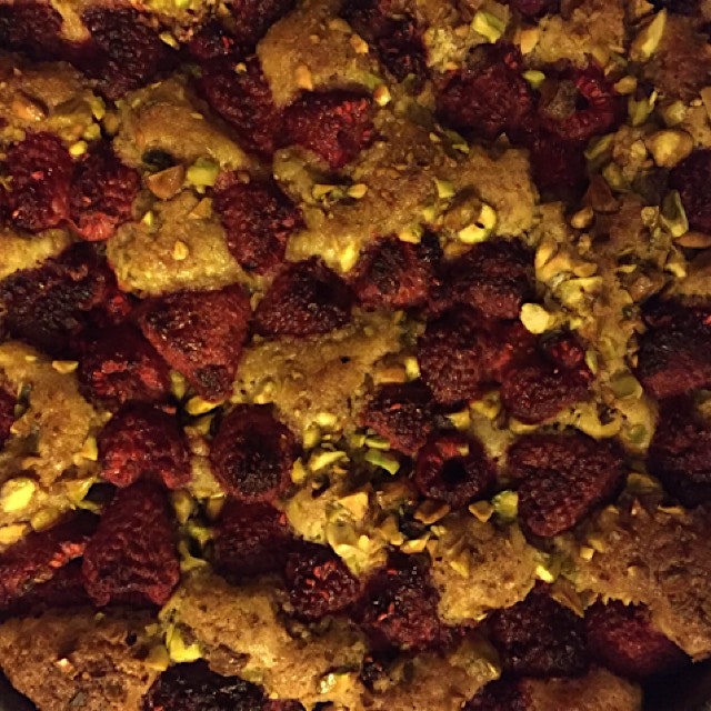 Lemon olive oil cake with raspberries and pistachios 