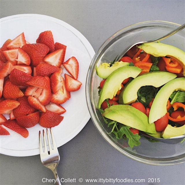 Arugula And spinach salad with avocado, Green Goddess dressing & a side of strawberries