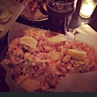 Late night bar food turned up a generously sized crawfish roll... It had kettle cooked potato chips strewn in and around! 