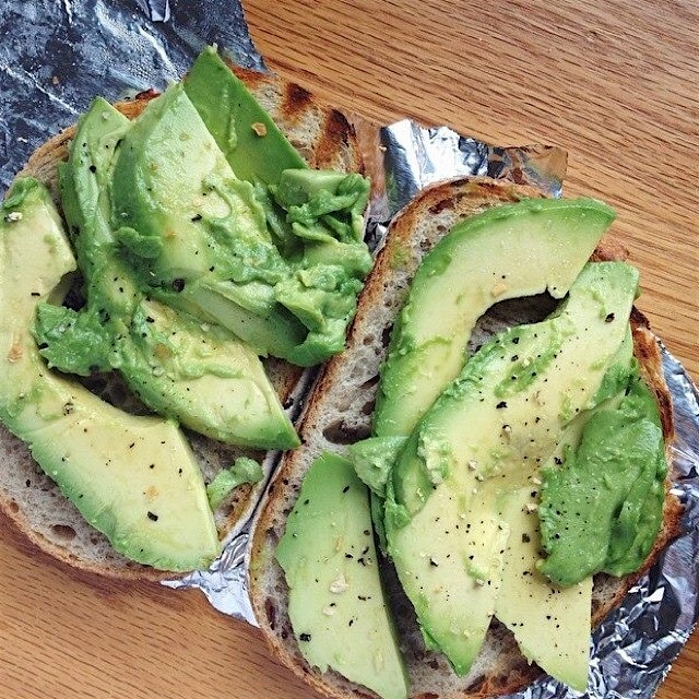 The most perfect avocado toast on olive rosemary sourdough from Silver Moon Bakery