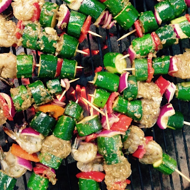 Shrimp, zukes, peppers and onions, marinated in Lime Leaf Sambal and cooking on the grill. #auria...