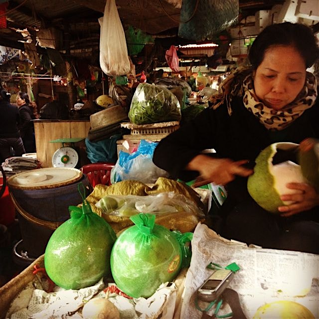 Cutting up some fresh pomelo for me! Hanoi, Vietnam 