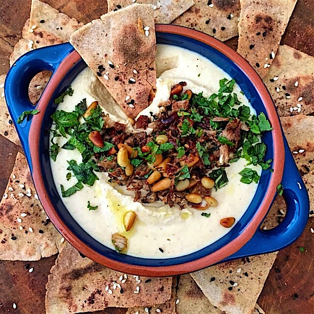 Hummus. With some chopped turkey sautéed with spices, pine nuts and mint on top. So it's not nekk...