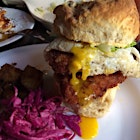 Ridiculously delicious fried chicken, deviled egg AND fried egg, buttermilk biscuit sandwich.