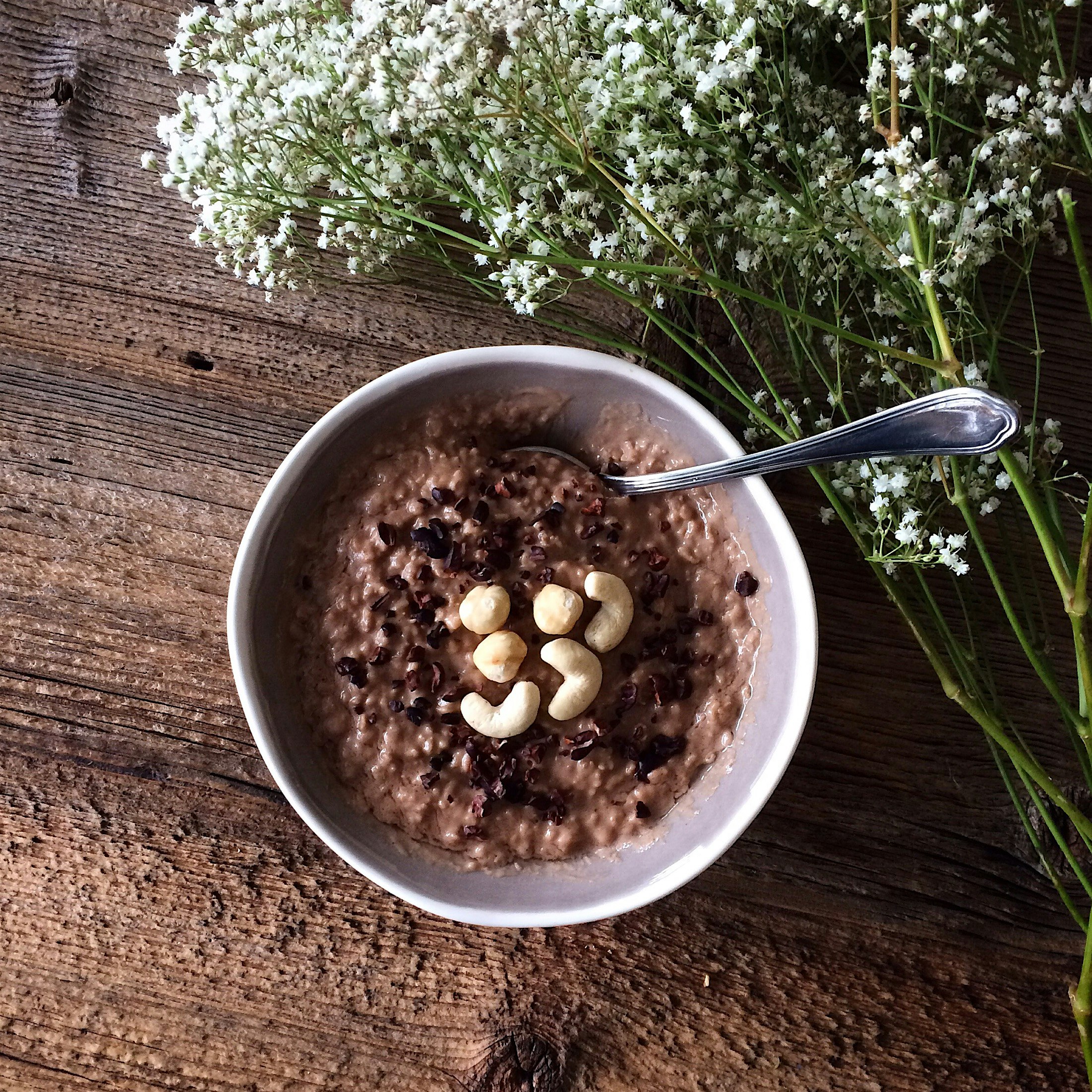 Creamy oats with raw cacao powder, coconut oil and maple syrup!