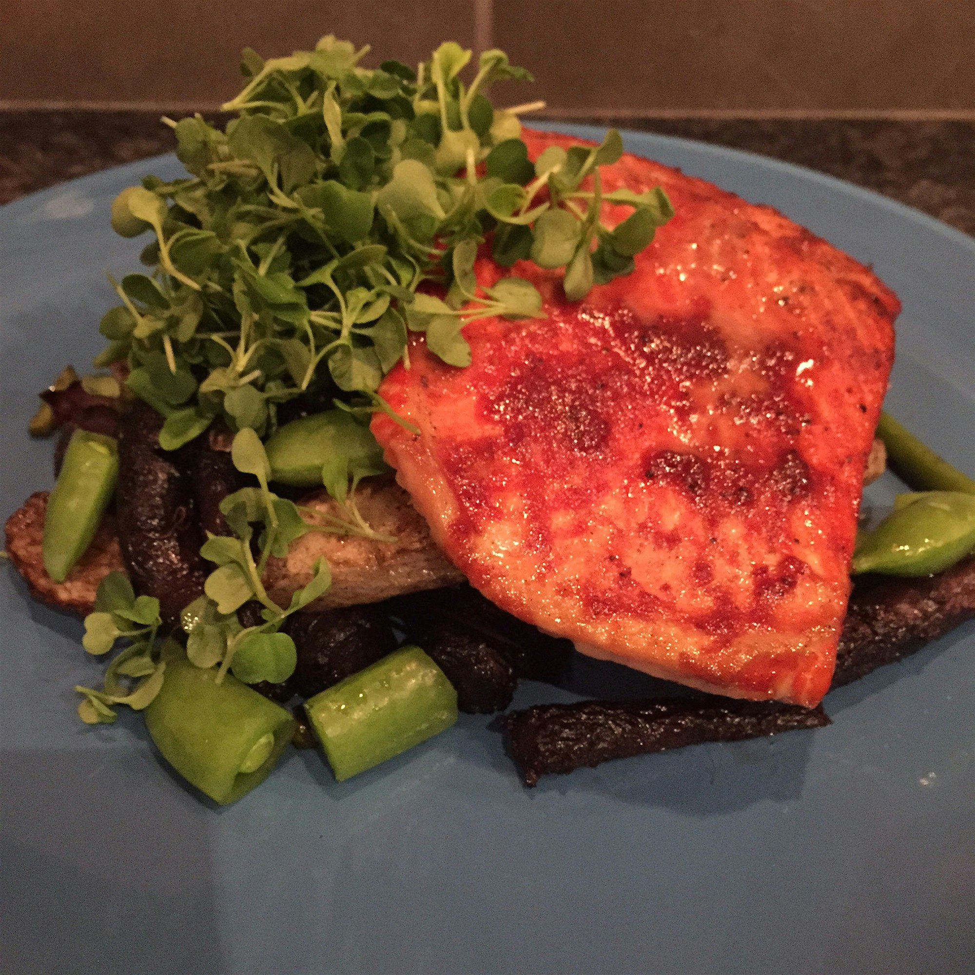 Iowa farmstand carrots, turnips, and scapes roasted on the grill and topped with Iowa farmstand m...