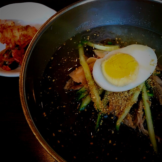 In the summer heat a bowl of Korean Mul Naengmyeon which is a cold noodle soup is very refreshing...
