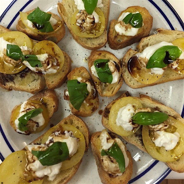 burrata toast rubbed with garlic! tomato, basil, garlic from the garden 