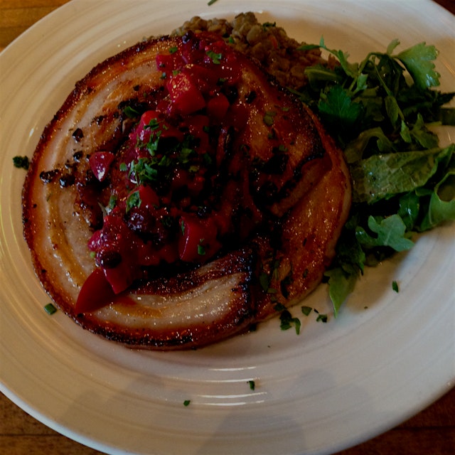 House-made porchetta stuffed with fennel compote, topped with plum mostarda. Some porky warm lent...