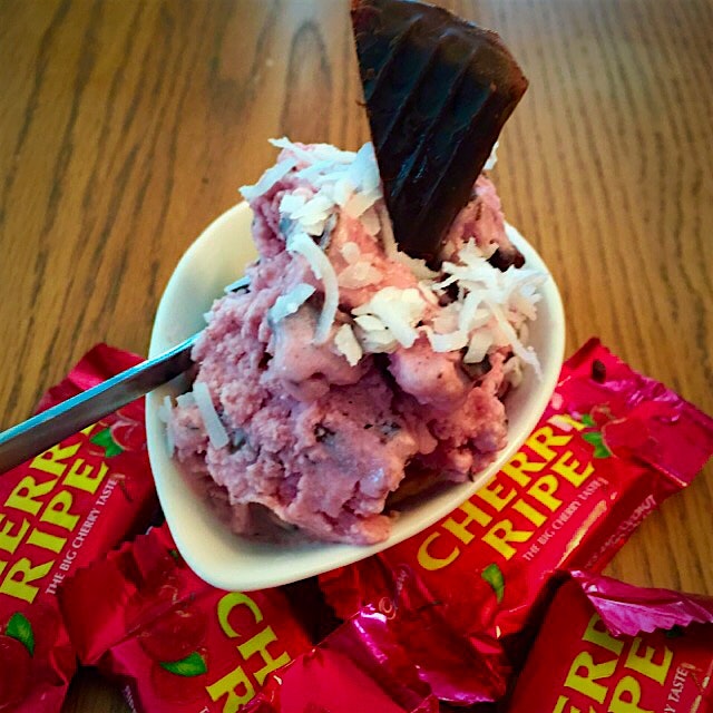 Fresh Cherries, cream and Dar Chocolate. Just added some coconut and it is just like my favourite...