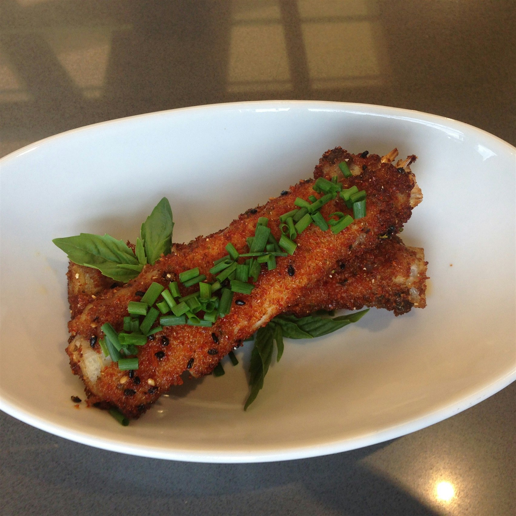 Kombu Smoked Monkfish "Ribs" with Togarashi and Basil. 
#wholefishutilization
